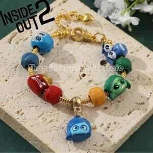 Gold Plated Disney Inside Out Themed Charm Bracelet Adjustable Sizing Design